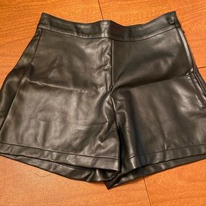 Black faux leather shorts